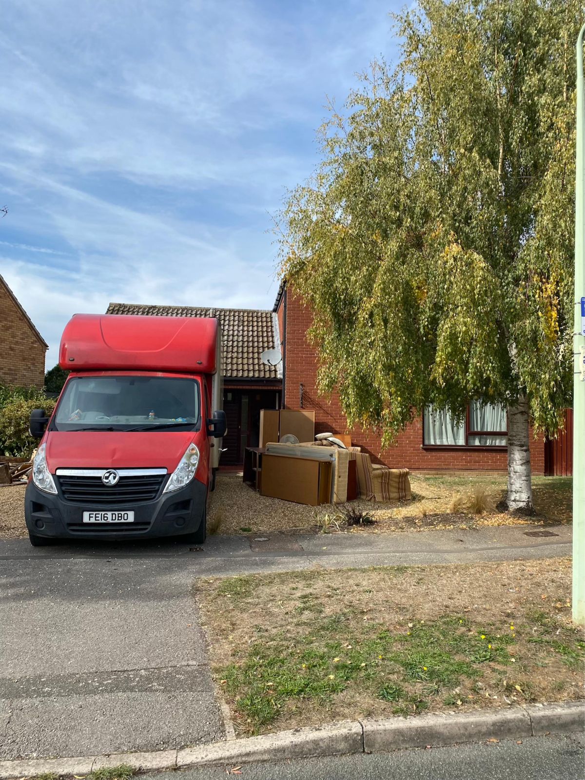 Our van on a driveway during a clearance job