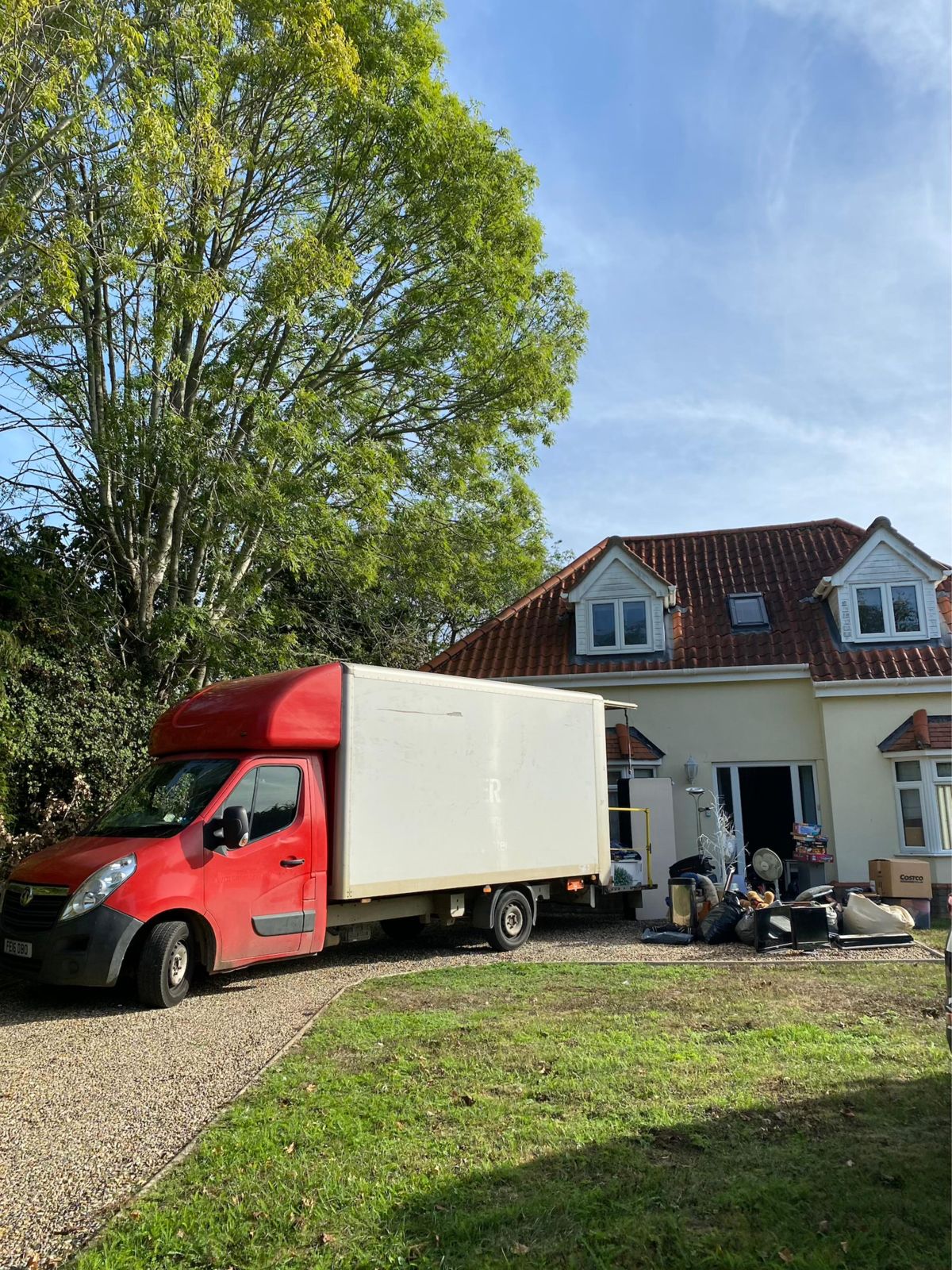 East Anglia Clearance & Removals van outside a house during a clearance